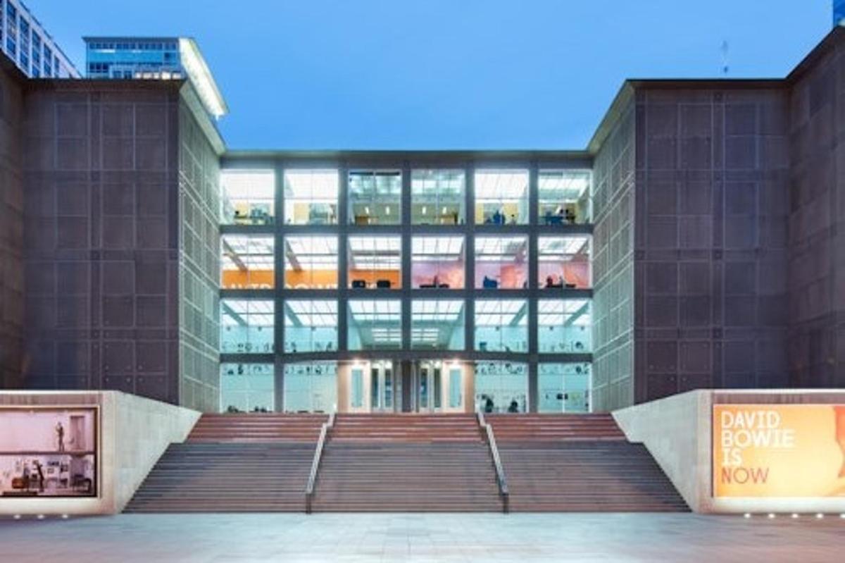 a large building with a staircase in front of it