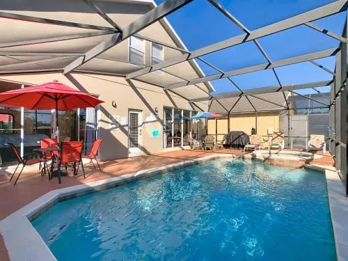 Pool, spa & game room near theme parks photo 2