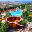 an amusement park with a pool and a water slide