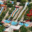 an aerial view of a water park with a roller coaster
