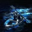 a person in a kayak in the water at night
