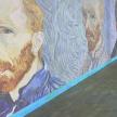 a painting of a man with a beard on a wall