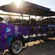 a purple car parked in a parking lot