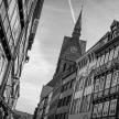 a black and white photo of a building with a church