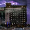 a building with lightning bolts on top of it