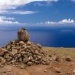 a pile of rocks sitting on top of a mountain