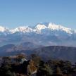 a view of a mountain range with snow covered mountains