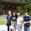 a group of people standing in front of a temple