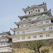 a large white building on top of a wall