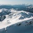 an aerial view of a snow covered mountain