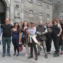a group of people standing in front of a building