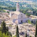 an aerial view of a village with a church