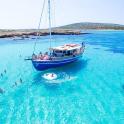 a group of people on a boat in the water