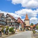 a street in a town with a clock tower