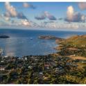 an aerial view of a bay with boats in the water