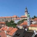 a view of a city with buildings and a clock tower