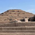 an amphitheater with steps in front of a pyramid