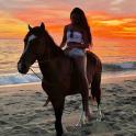a woman riding a horse on the beach
