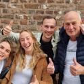 a group of people giving the thumbs up