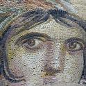 a mosaic portrait of a woman in a veil