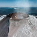 a snow covered mountain with snow on top of it
