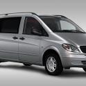 a silver van is parked on a white background