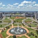 an aerial view of a city with a fountain