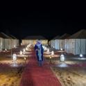 a person standing in front of a group of lights