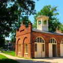 a brick building with a clock tower on top