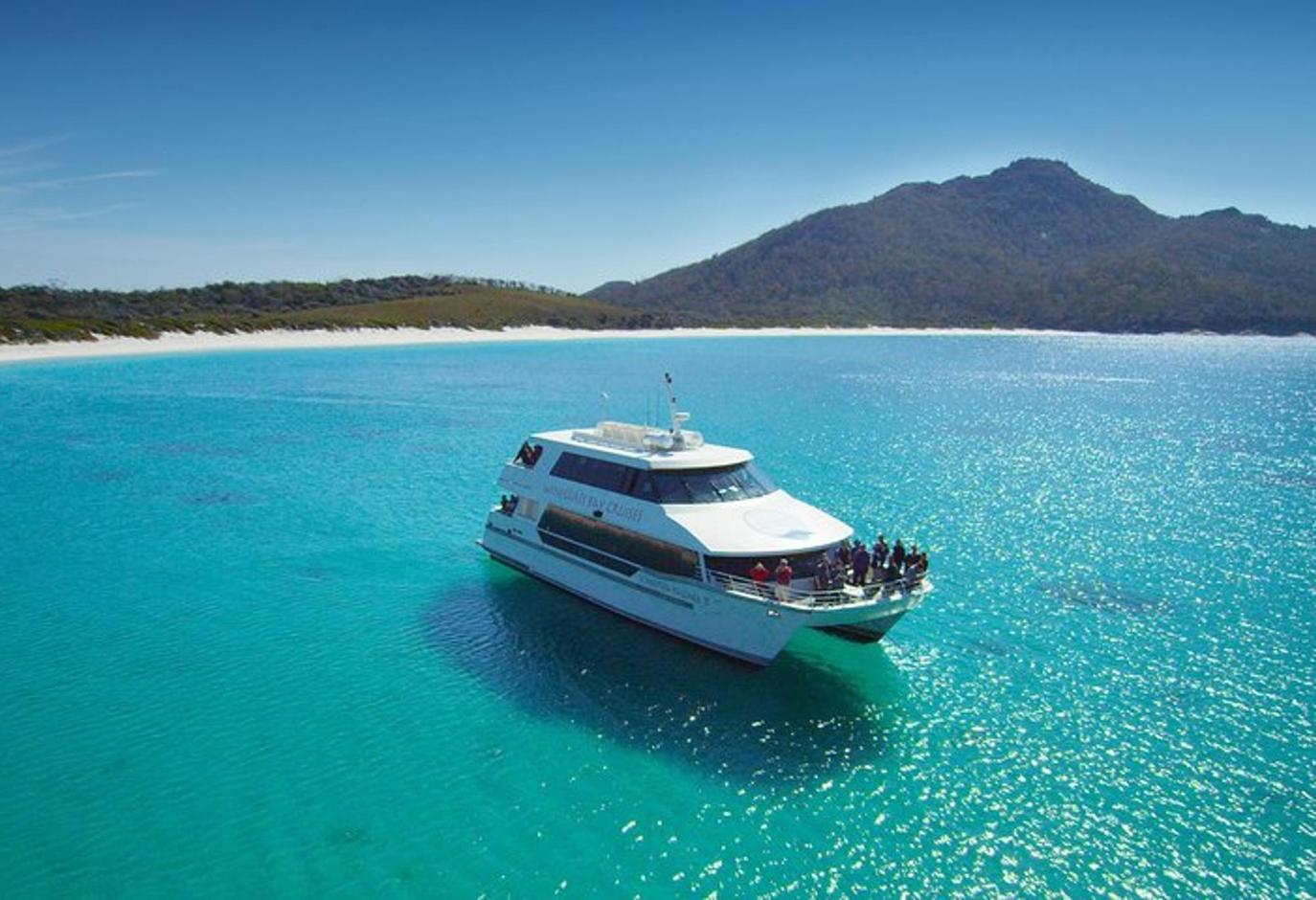 a boat in the middle of a large body of water