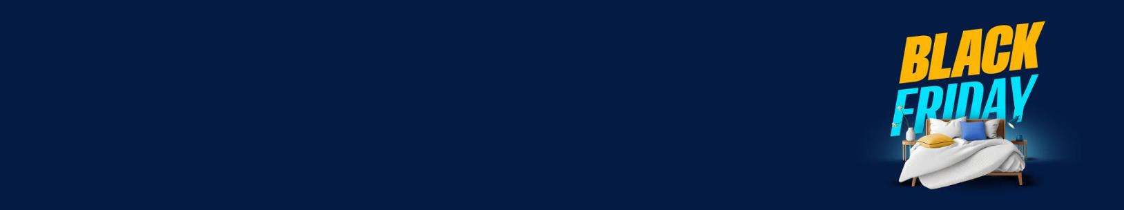 Ένα διπλό κρεβάτι μπροστά από μεγάλο λογότυπο Black Friday