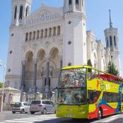 a double decker bus parked in front of a building