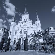 a black and white photo of a building with a clock tower