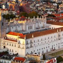 an aerial view of a large building in a city
