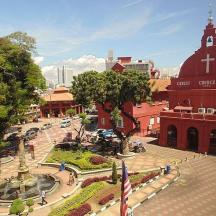 an aerial view of a building with a church
