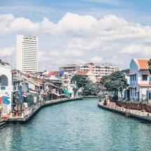 a view of a river in a city with buildings