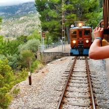 a person taking a picture of a train