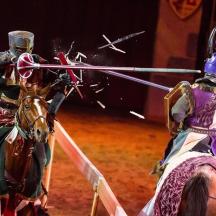a man and a woman on a horse in a circus