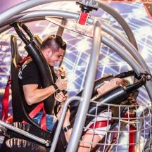 a man riding on a roller coaster