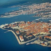 an aerial view of an island in the water