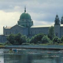 a large building next to a body of water