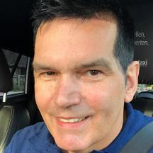 a man is sitting in a car