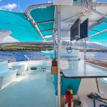 a view from the back of a boat in the water