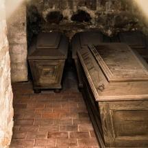 a small room with two beds in a building