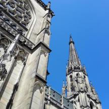 a tall building with a steeple on top of it
