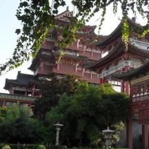 a large building with a tower in front of it