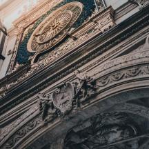 a building with an ornate design on the side of it