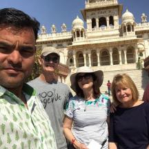 a group of people standing in front of a building