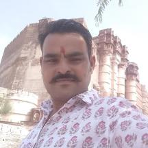 a man standing in front of a building