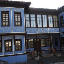 a blue building with a lot of windows